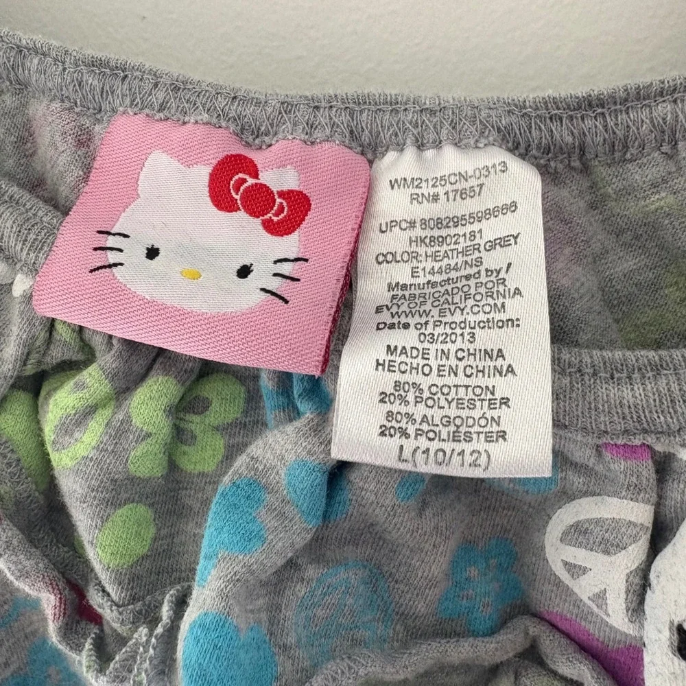 Hello Kitty‎ Romper Jumpsuit Ruffle Trim Hearts Peace Signs Gray Girls L (10/12)